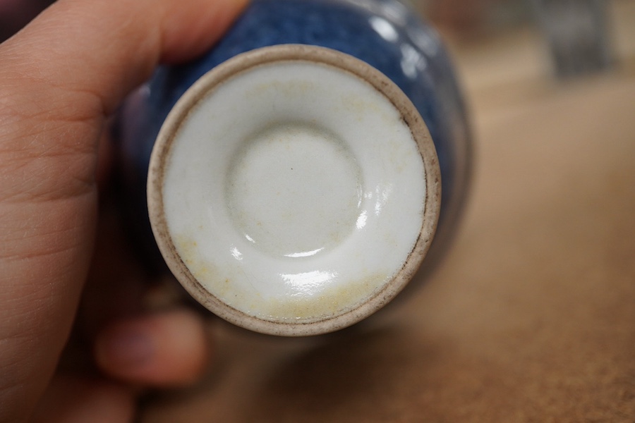 A Chinese powder blue stem cup and a blue and white 'shou' cup, largest 10cm in diameter. Condition - good